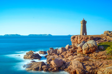 Fototapeta na wymiar Ploumanach lighthouse, pink granite coast, Brittany, France.