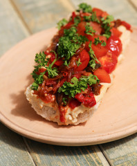 Baguette with roasted vegetables and hummus