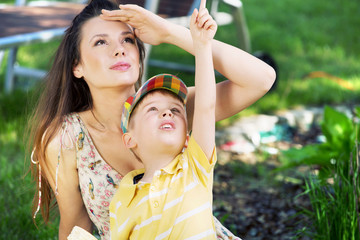 Little son showing his mom something interesting