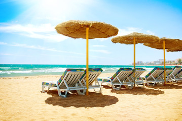 Vacation Concept. Spain. Beach Costa del Sol. Mediterranean Sea - obrazy, fototapety, plakaty
