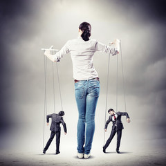 Businesswoman puppeteer