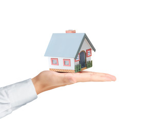 holding house representing home ownership