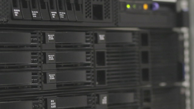 servers stack with hard drives in a datacenter