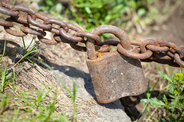 Rusty chain with lock