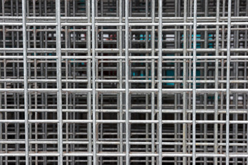 background of squares on a heap of metallic fences