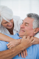 Fototapeta premium White haired woman hugging husband