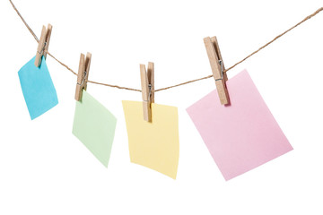 colorful of paper notes hanging on on the rope with clothespins
