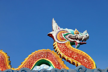 naga statue on roof of temple - obrazy, fototapety, plakaty