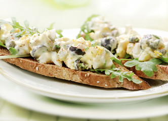 egg salad with toast served on a plate