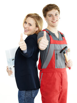 Apprentices for car mechanic and office show thumbs up