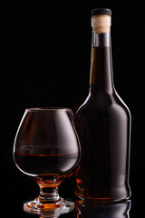 Bottle and glass of cognac