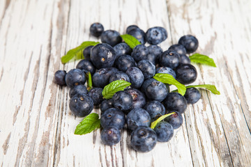 Fresh blueberries on wood