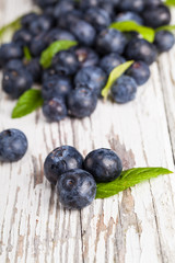 Fresh blueberries on wood