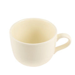 Ceramic cream colored cup isolated