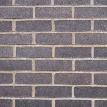 Black brick wall composition