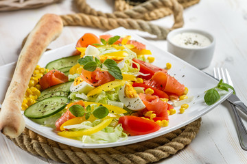 Healthy salmon and fresh vegetables