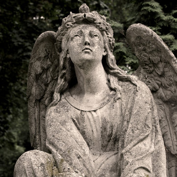 Sadness - angel statue in sepia