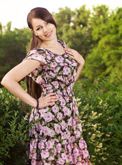 Fototapeta premium Beautiful young woman in the park