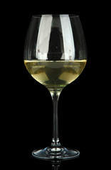 Glass of white wine, isolated on black