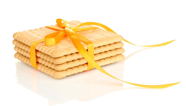 Sweet cookies tied with yellow ribbon isolated on white