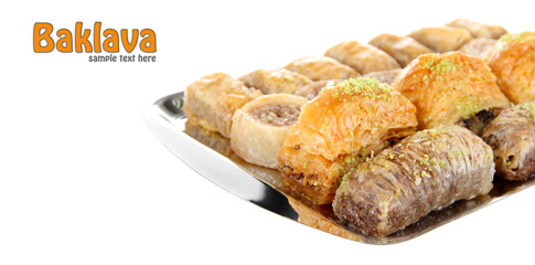 Sweet baklava on tray isolated on white
