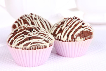 Sweet chocolate cupcakes close up