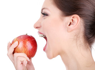 woman with apple isolated on white