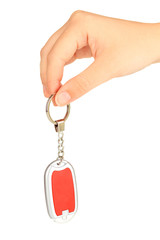 Keychain in hand  isolated on white