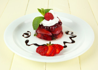 Tasty jelly dessert with fresh berries,
