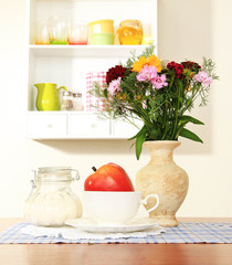 Kitchen composition on table on shelf background