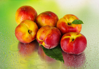 Peaches on metal green background