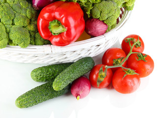 Fresh vegetables in white wicker basket close up