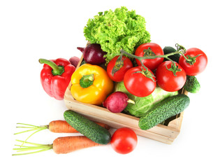 Fresh vegetables in wooden box on grey background