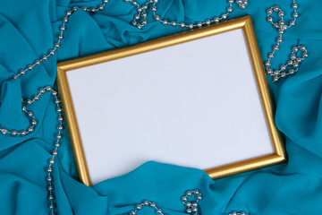 Empty frame on beautiful silk background