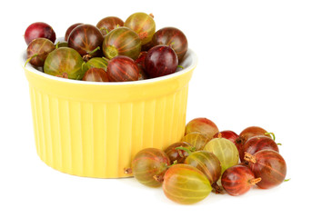 Fresh gooseberries in bowl isolated on white