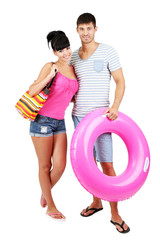Beautiful loving couple at summer vacation isolated on white