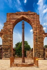 Fototapeten Iron pillar in Qutub complex © Dmitry Rukhlenko