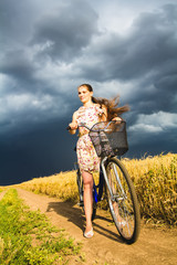 Obraz premium woman with bicycle