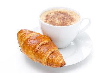 fresh croissant and cup of cappuccino isolated