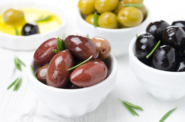 kalamata olives, black and green olives, rosemary and olive oil