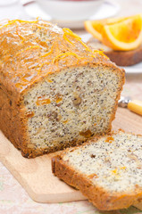 orange cake with poppy seeds, dried apricots, walnuts and honey