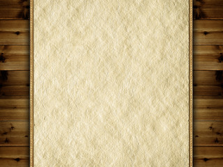 Handmade paper on wooden background