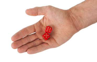 Hand holding red dices