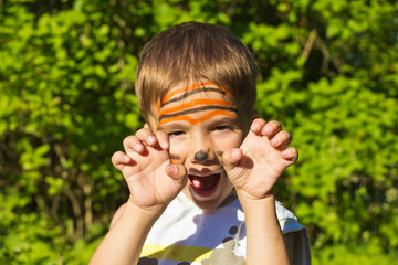 a child with a painted face