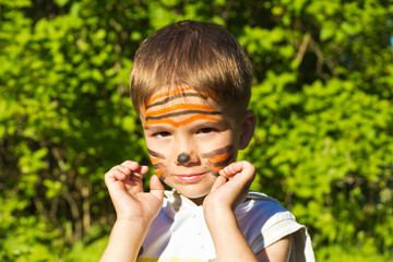 a child with a painted face