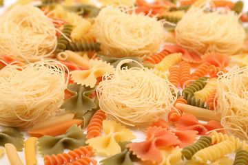different pasta in three colors close-up.