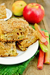Pie rhubarb and apple on a wooden board