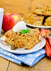 Pie with rhubarb  and ice cream on the board