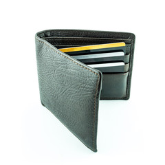 brown wallet with credit cards on a white background
