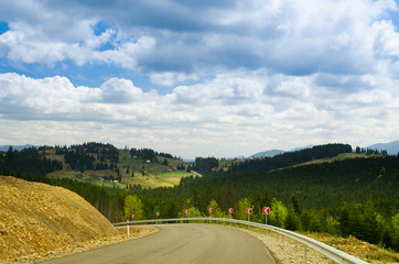 Road in forest mountain. Carpathian, Ukraine.